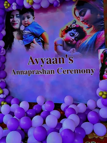 A close-up of the personalized backdrop for Avyaan's Annaprashan Ceremony.