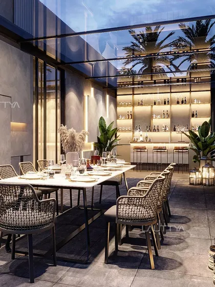 This concept for an alfresco dining area combines elegance with an outdoor setting. A glass roof allows for dining under the stars, while a fully stocked bar, ambient lighting, and sophisticated decor create a refined atmosphere for any gathering.