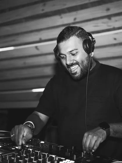 In the zone, mixing a blend of Afro House and Tech House tracks at Yazu. This is where I feel most alive, behind the decks.