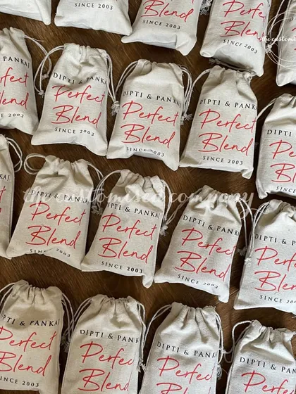 "Perfect Blend" hangover kits for a couple's anniversary celebration. These custom-printed muslin bags are filled with everything guests need to recover after a great party.