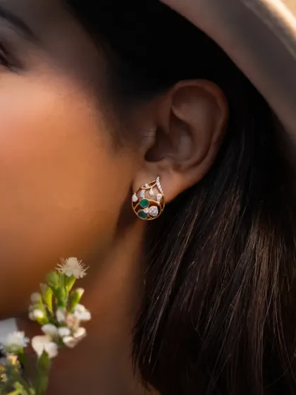 A close-up of the Aranya earring, where nature meets structure. The piece is understated, intentional, and effortlessly striking.