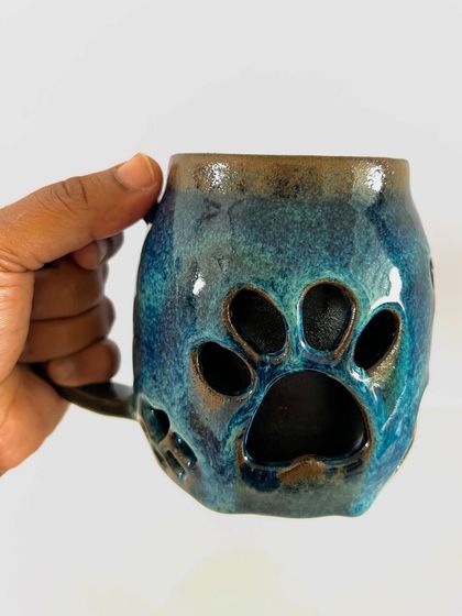The double-walled paw mug fits so comfortably in the hand. I designed the handle to be ergonomic, making it your go-to mug for your morning coffee.