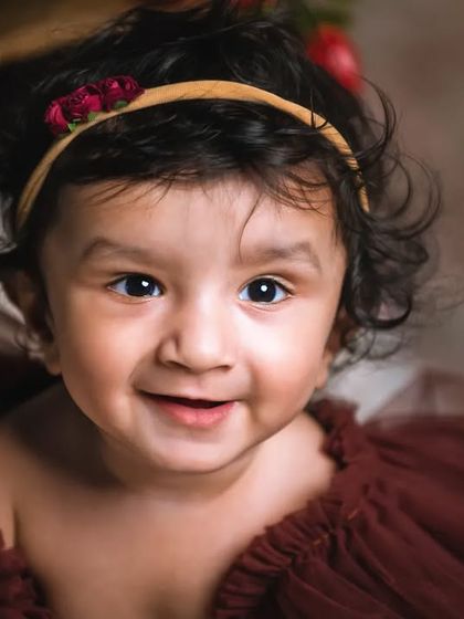 A sweet and gentle smile that lights up the entire photo. I aim to create a comfortable space where even the shyest babies feel ready to share a smile.