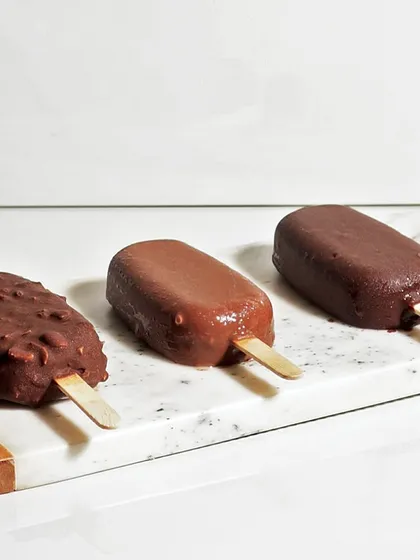 A trio of our luxurious ice cream bars, ready to be enjoyed. Place your order now and taste heaven!
