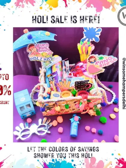 Announcing a Holi sale with this playful and colorful hamper. It's packed with snacks, colors, and fun accessories like festive glasses, all presented in a decorated basket with a "Bura na mano, Holi hai" sign.