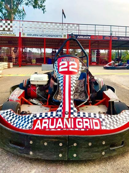 A close-up of one of our signature karts, waiting in front of the pit building. This is how you treat yourself to a dose of adrenaline.