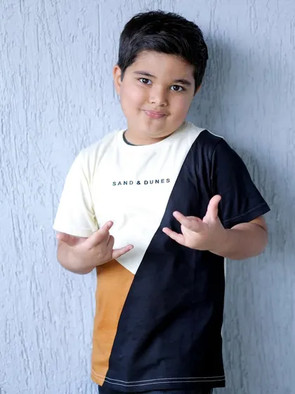The birthday boy showing off his cool side with a fun pose for the camera. I always encourage kids to be themselves during their birthday photoshoot.