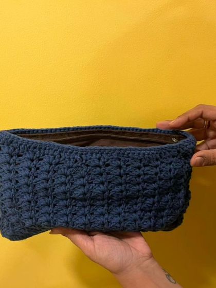 I love reinventing old things. I upcycled an old clutch by giving it a new crochet cover with a beautiful tulip stitch design. It feels brand new again.