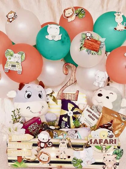 Creating this safari-themed hamper for a second birthday party was so much fun. It’s packed with adorable animals, balloons, and treats to make the celebration a wild adventure.