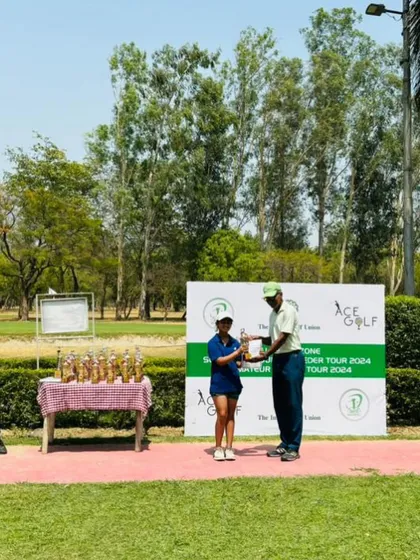 Unnati Singh with her trophy for a second runner-up finish at the same event.