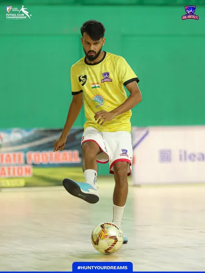 A player controlling the ball during the warm-up session.