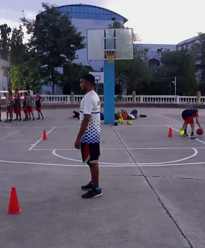 Players at the camp working on their dribbling skills under the watchful eye of our coach.
