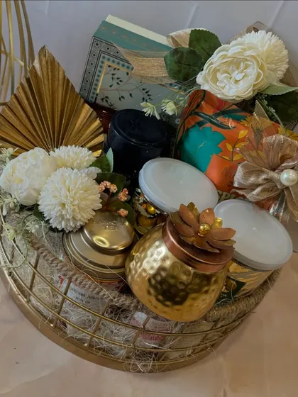 Another angle of our versatile metal and jute tray, showing off the golden accents and floral details that make it a standout choice for Diwali gifting.