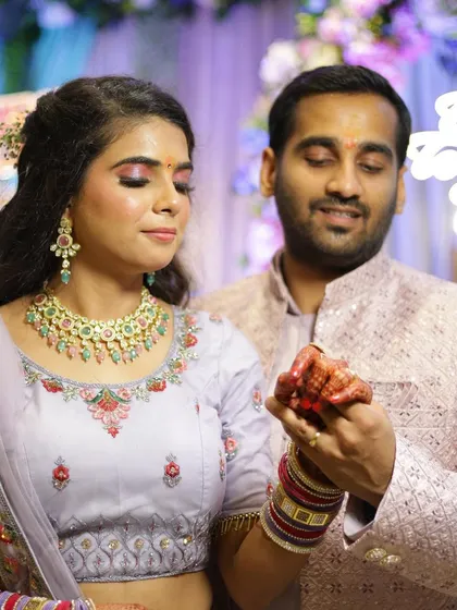 A close up showing the details of the engagement makeup. The shimmery eyeshadow and perfectly blended skin look flawless under the event lighting.