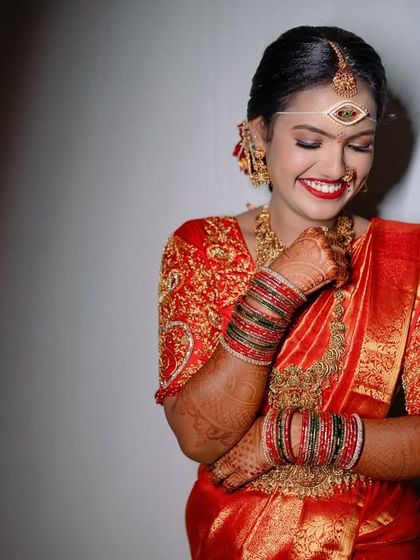 A shy, happy smile from a bride. We capture a range of emotions, from the big laughs to these quiet, joyful moments.