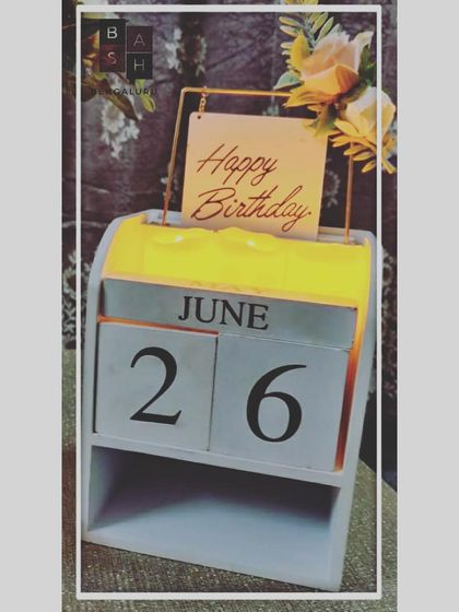 A personalized wooden block calendar is a wonderful way to highlight the special day. We often include these in our birthday and anniversary packages to add a custom, memorable element to the decor.
