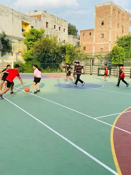 Players learn to dribble and pass in a game situation.