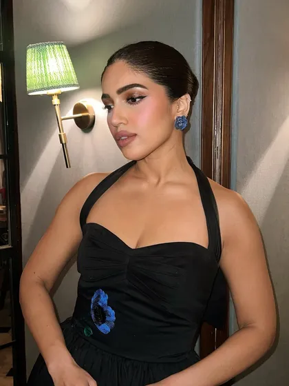 This is a classic Gauri & Nainika black halter dress I chose for Bhumi Pednekar for a Filmfare press conference. The timeless silhouette paired with unique floral earrings makes for an effortlessly glamorous look.