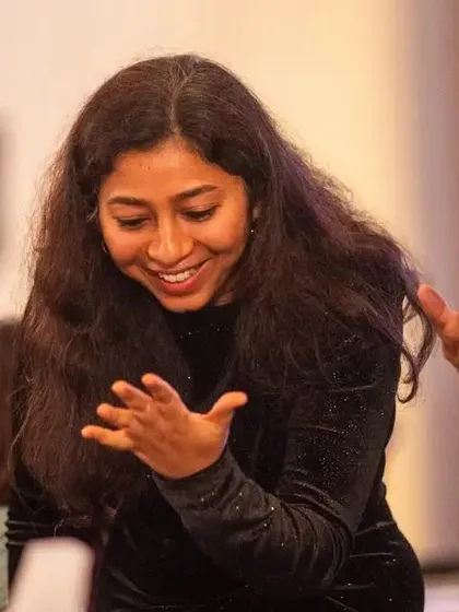 A guest's hands fly up in disbelief. It's these physical, involuntary reactions that show the true impact of a magical moment.