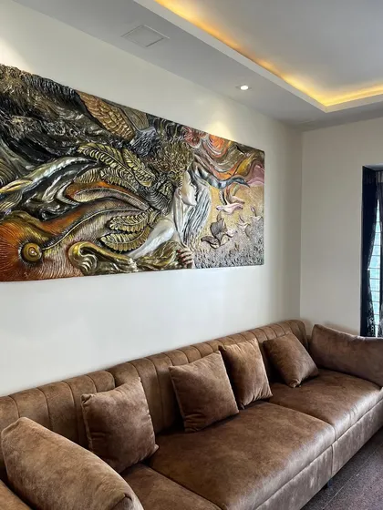 An angled view of the 'Self Love' mural, showing how the 3D elements catch the light.