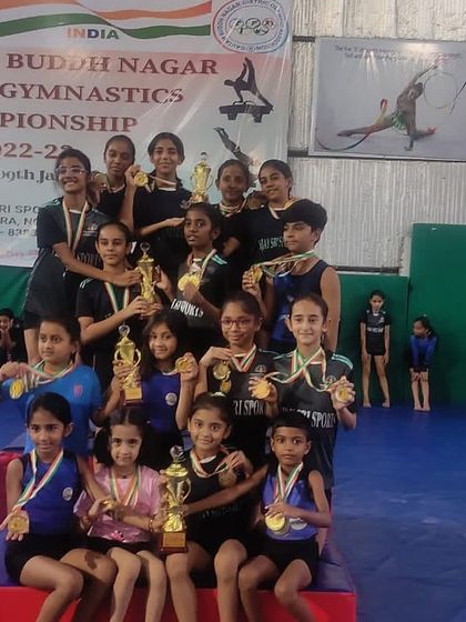 The whole team with their medals and trophies after a successful competition. These moments are what we work so hard for.