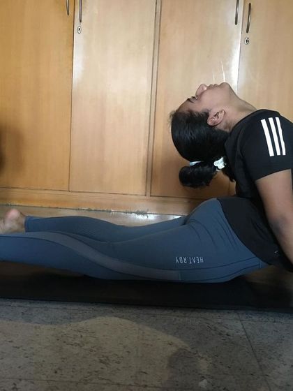 This student is practicing Bhujangasana (Cobra Pose) at home. It's a wonderful heart-opener that strengthens the spine and reduces stiffness in the lower back.