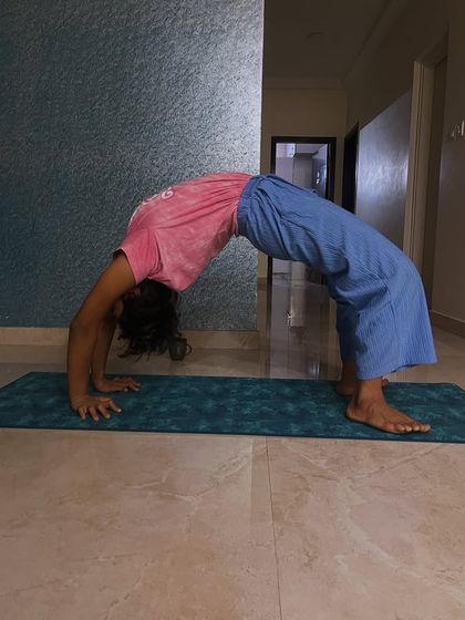 A simple yet effective wheel pose. Even foundational backbends are powerful for opening the heart and strengthening the spine.