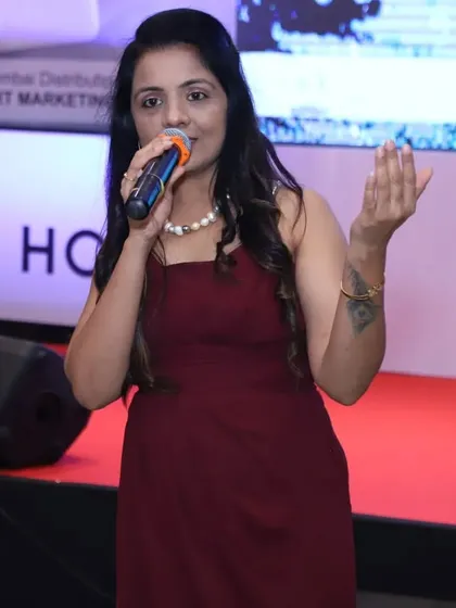 As a corporate event anchor, my role is to command the stage and guide the audience through the event's agenda. This was a moment from the Honor Mobile launch, where we combined tech reveals with live music.