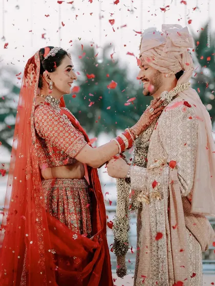 The pure, unscripted joy of a wedding ceremony. This is what I look for: the laughter, the shower of petals, and the real emotions that make your day uniquely yours.