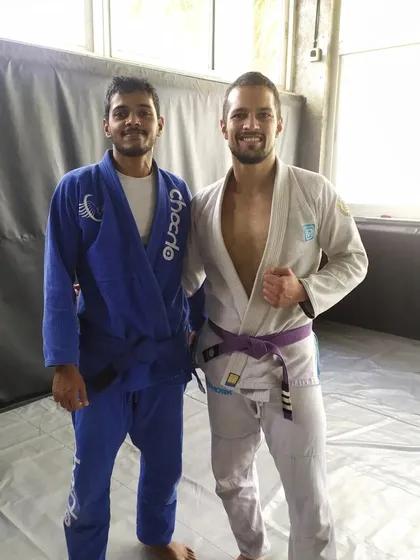 Posing with my coaches and senior belts. Learning from experienced practitioners is the key to growth in Brazilian Jiu-Jitsu.