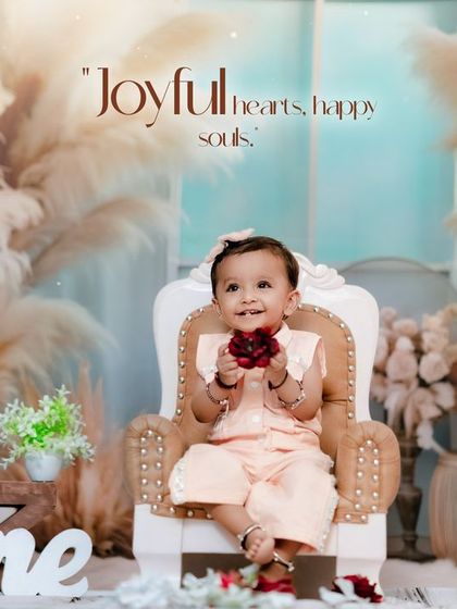 Joyful hearts and happy souls. A beautiful, smiling portrait from a first birthday session in our popular boho-chic studio.