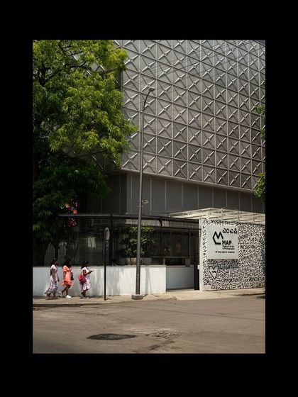 A street view of the MAP museum, capturing its presence in the urban landscape of Bangalore.