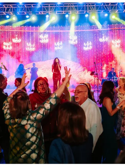 We bring in top-tier live bands to elevate the celebration, like this retro-pop band that had everyone dancing at the reception.