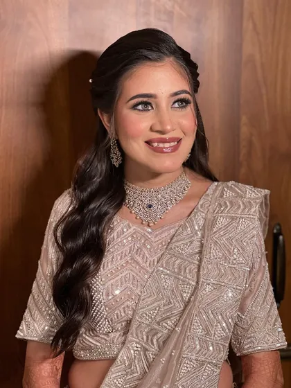 A beautiful portrait of the bride, looking elegant and ready for her reception.