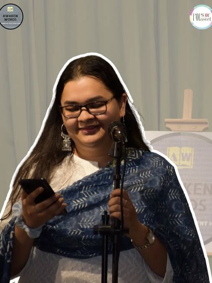 A poet shares her heartfelt words with the supportive crowd.