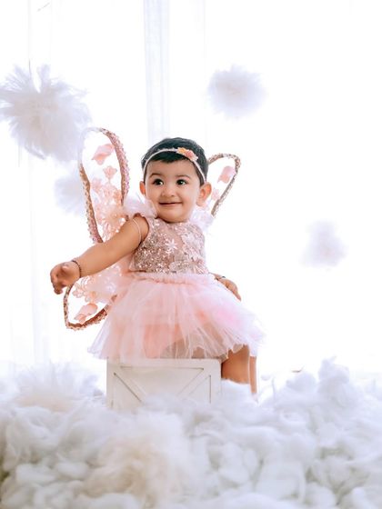 Another angelic pose from this heavenly cloud session. These portraits are truly timeless.