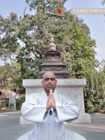 Performing the Shaolin salute in the Pagoda Forest. This gesture of respect connects us to all the masters who came before.
