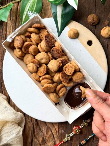 Part of our Rakhi collection, this mini cookie box was a huge hit. It’s filled with bite-sized, crunchy cookies and comes with a rich chocolate dip, offering a fun and interactive alternative to traditional sweets.