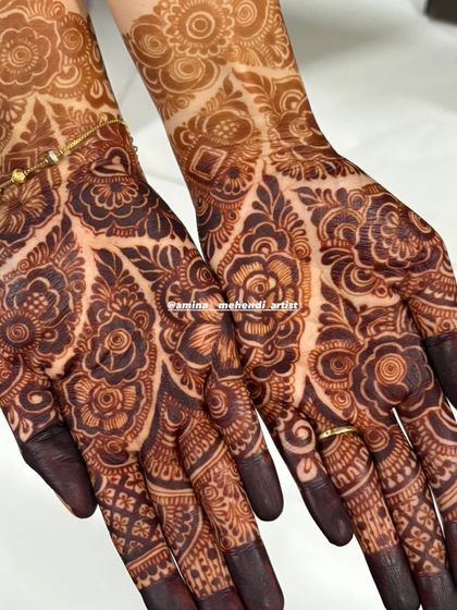 A close-up of the palms showing a rich, dark stain. This is the kind of color and clarity I love to deliver.