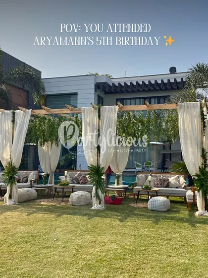 POV: You attended Aryaman's 5th birthday. This image shows a chic and comfortable outdoor lounge area I designed for the adults to relax while the kids played.