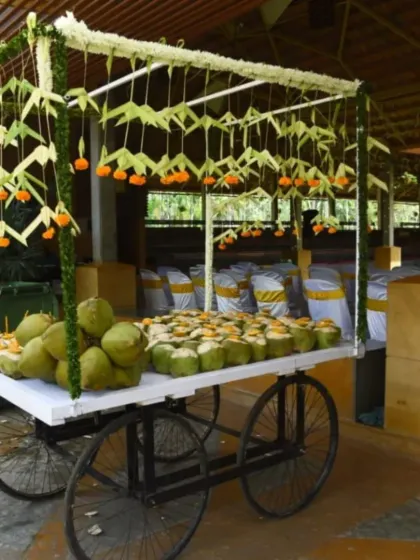 I focus on details that make your guests feel pampered. A decorated tender coconut cart is a perfect example, offering a refreshing and unique welcome drink that adds a thoughtful touch to a South Indian wedding celebration.