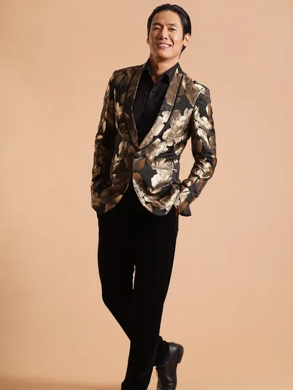 Glamour isn't just for women. Here, I created a polished, red-carpet-ready look for actor Zander Lama, featuring glowing skin and perfectly coiffed hair to match his statement floral blazer.