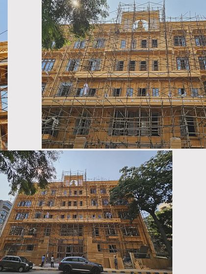 A collage of construction photos of the Jain Upashray. These images provide multiple angles of the building's facade, showcasing the intricate stonework and traditional architectural elements as they are being installed.