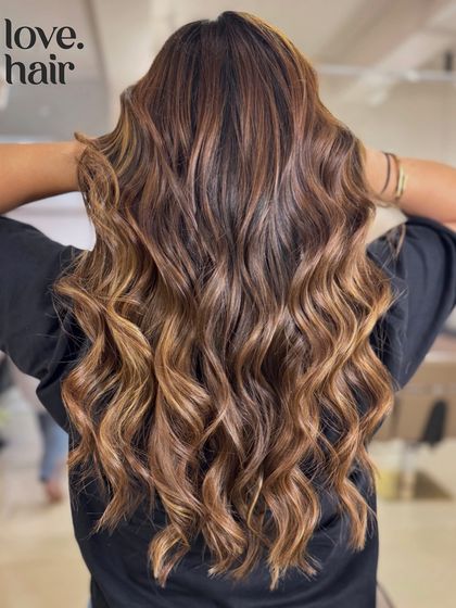 The full, glorious back view of the 'brown butter almond' balayage. Look at that dimension and shine.
