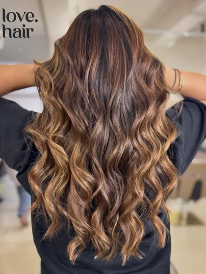 The full back view of this stunning, long balayage, perfect for a client who wants a natural but impactful look.