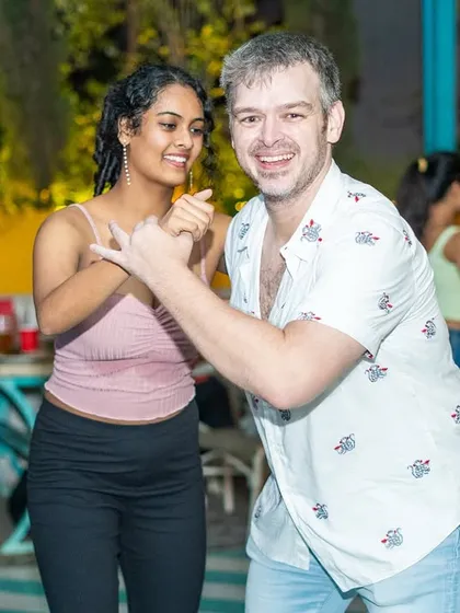 The dance floor is where our community comes to life. This is a moment from our weekly social, La Rumba, where we connect, express ourselves, and just enjoy the music. It's all about the smiles and the shared joy of Latin dance.