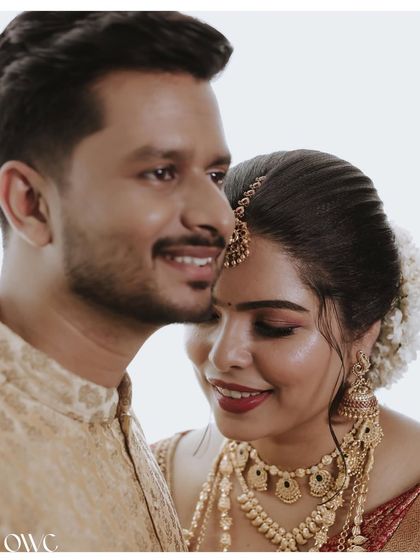 Orange Wedding Cinemas - Wedding Photography & Cinematography Timeless Kerala Traditions photo 33