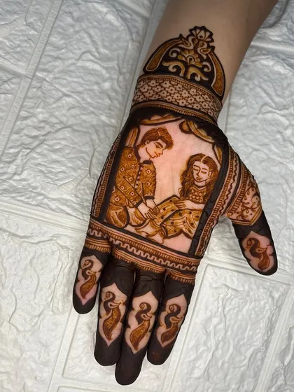A simple yet profound depiction of a couple's love story. This portrait captures a quiet, intimate moment, framed by elegant patterns and peacock motifs on the fingers.