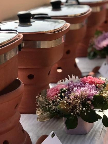 For a client's 70th birthday, I styled and catered this lazy, sunny terrace brunch. The setup included these beautiful terracotta warmers to keep the winter delicacies hot.