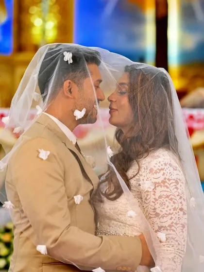 An intimate moment shared under the veil during a beautiful Catholic church wedding. We are experienced in capturing the solemnity and grace of Christian wedding ceremonies.
